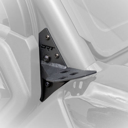 Side view of bracket mounted on UTV with grey faded background
