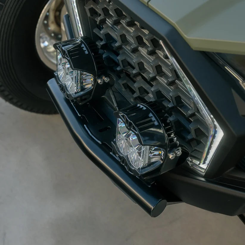 Close-up of a motorcycle headlight with intricate design