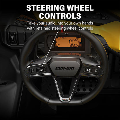 Steering wheel with retained audio controls in a vehicle interior, featuring the Can-Am brand.
