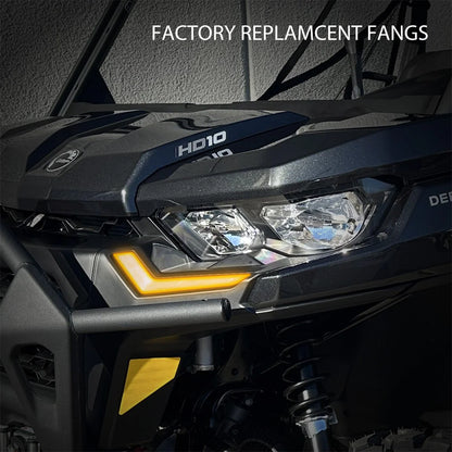 Close-up of a vehicle's headlight with 'Factory Replacement Fangs' text above.