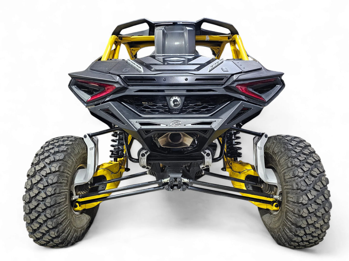 Front view of a yellow and black off-road vehicle on a white background