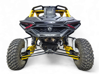 Front view of a yellow and black off-road vehicle on a white background