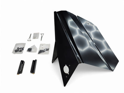 Black electronic device with components on a white background