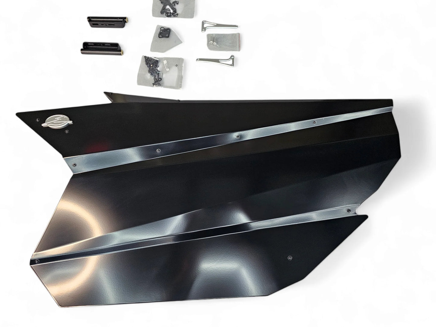 Metal car fender with additional parts on a white background