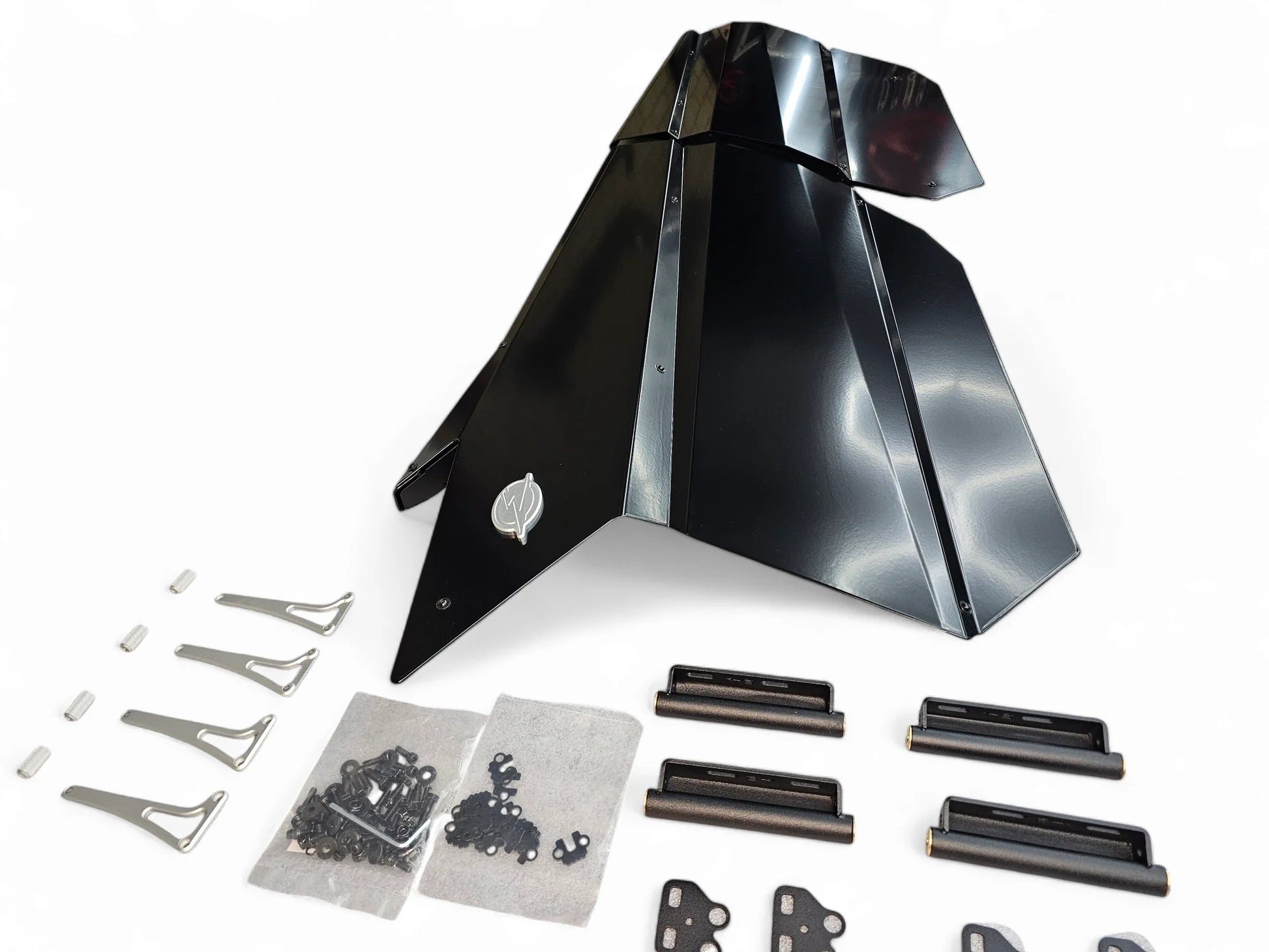 Motorcycle fairing kit with various components on a white background