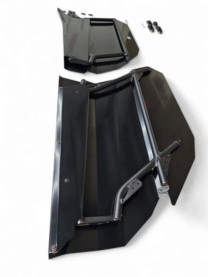 Black metal vehicle side panel with brackets on a white background