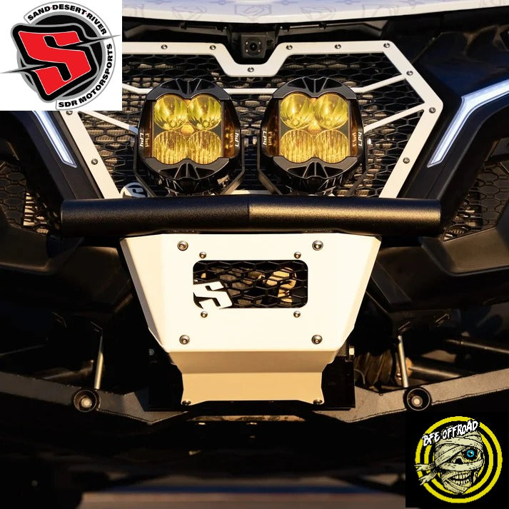 A close-up of an off-road vehicle front bumper assembly featuring two round yellow-tinted LED light bars, a black tubular front bumper bar, a white and black front bumper cover, and a black grille. Brand logos forSDR and  BFE Off Road Parts are visible as overlays.