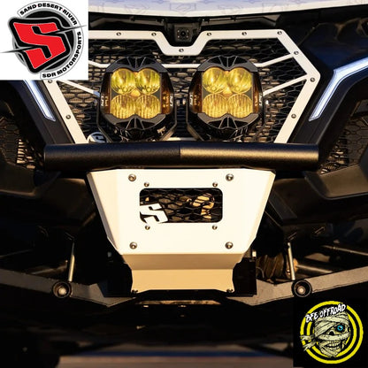 A close-up of an off-road vehicle front bumper assembly featuring two round yellow-tinted LED light bars, a black tubular front bumper bar, a white and black front bumper cover, and a black grille. Brand logos forSDR and  BFE Off Road Parts are visible as overlays.