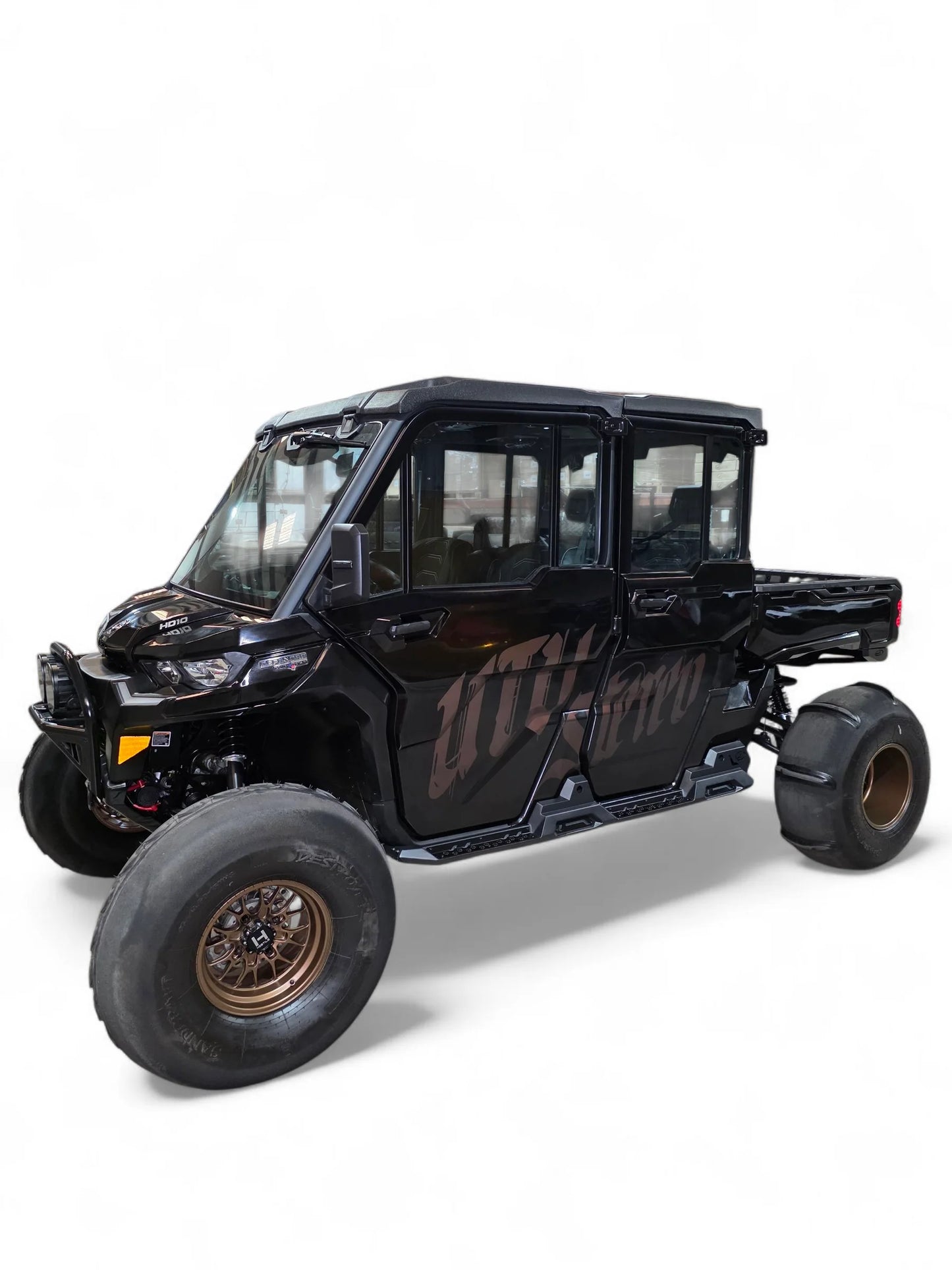 Black off-road vehicle with 'UTV' branding on a white background