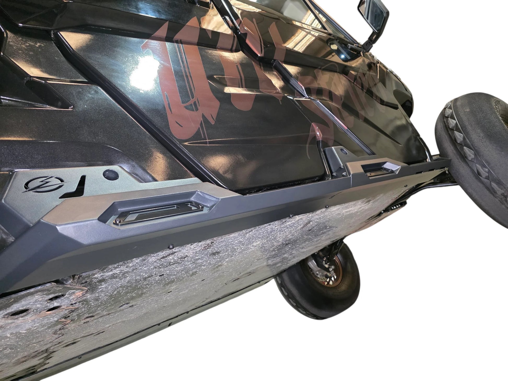 Close-up of a motorcycle's front section on a white background