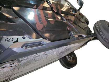 Close-up of a motorcycle's front section on a white background