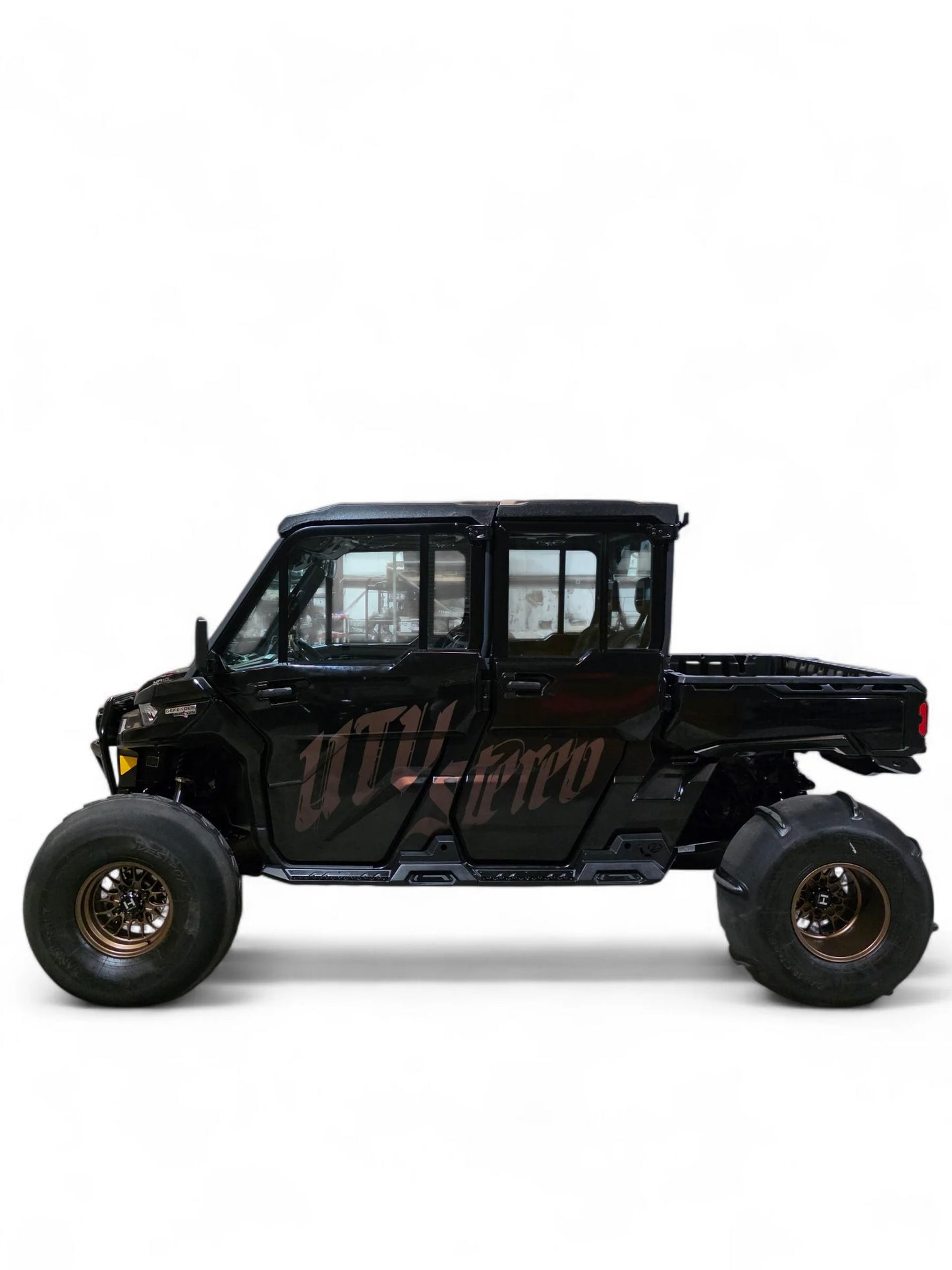 Black off-road vehicle with 'UTV Stereo' branding on a white background