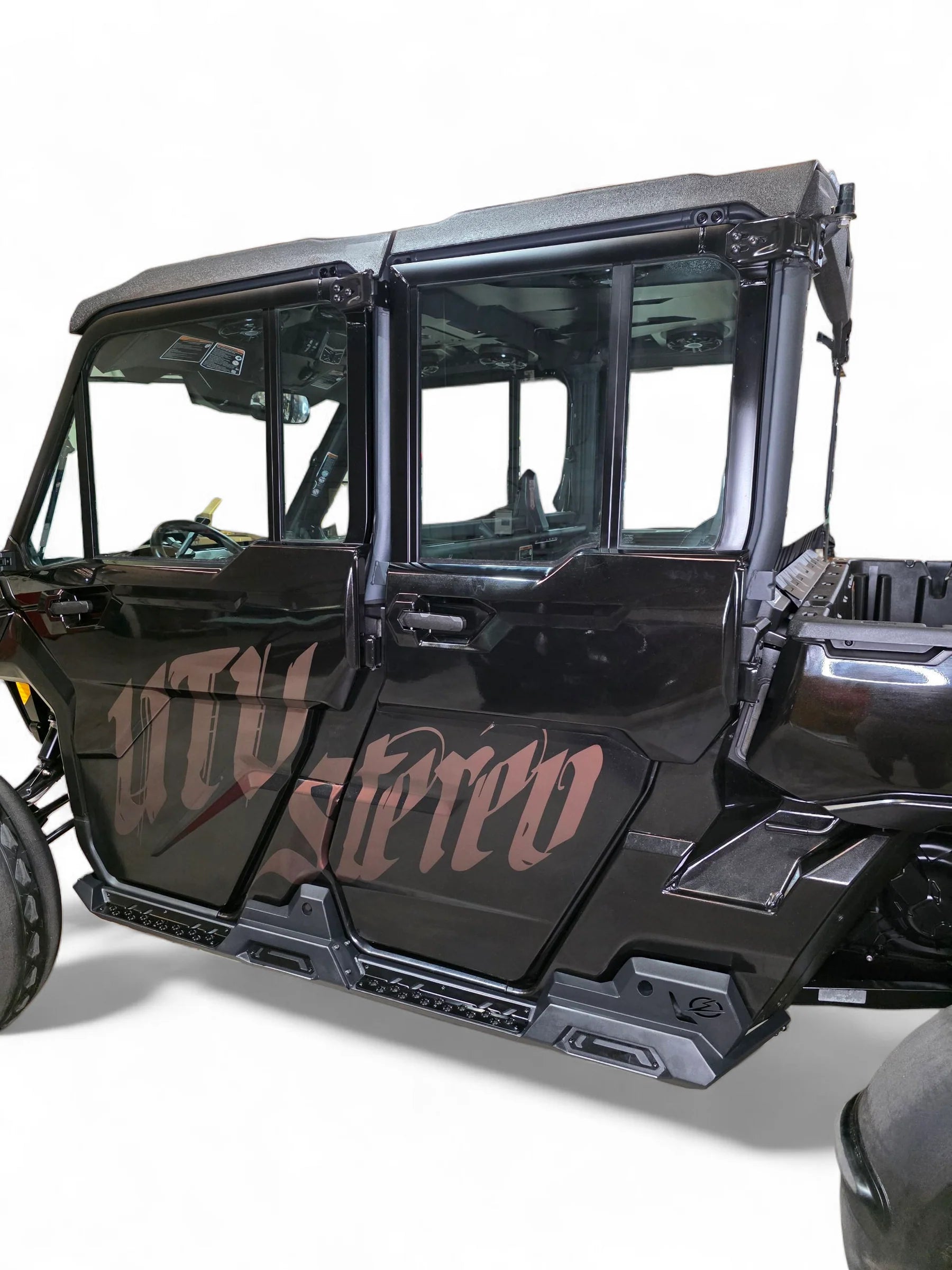 Black UTV with 'UTV Stereo' branding on a white background