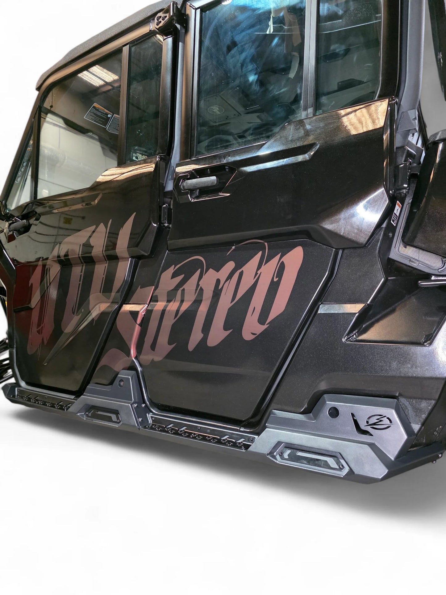 Black off-road vehicle with 'UTV Stereo' branding on a white background