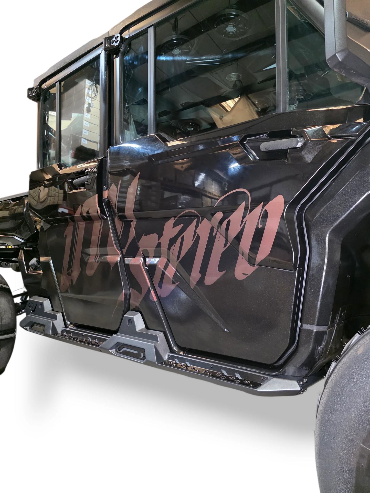 Black off-road vehicle with 'UTV Stereo' branding on a white background