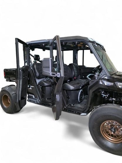 Black off-road vehicle with open doors on a white background