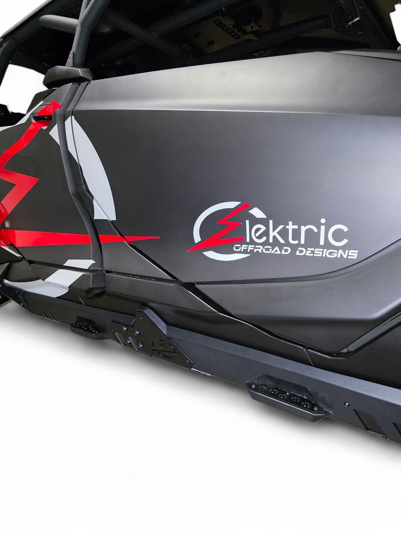 Side view of a vehicle with 'Elektric Offroad Designs' logo on a white background