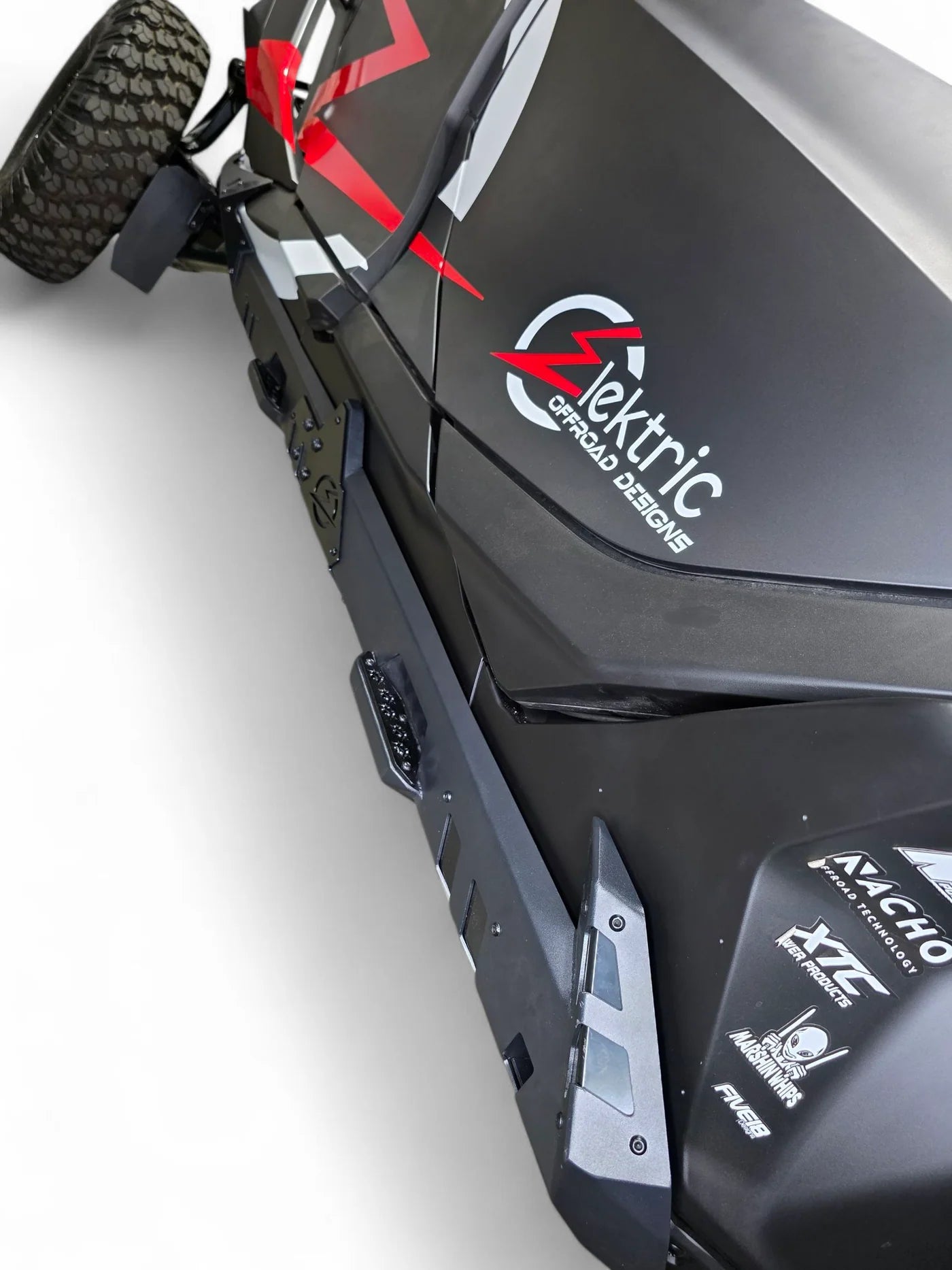 Close-up of a black electric scooter with 'Elektric' branding on a white background
