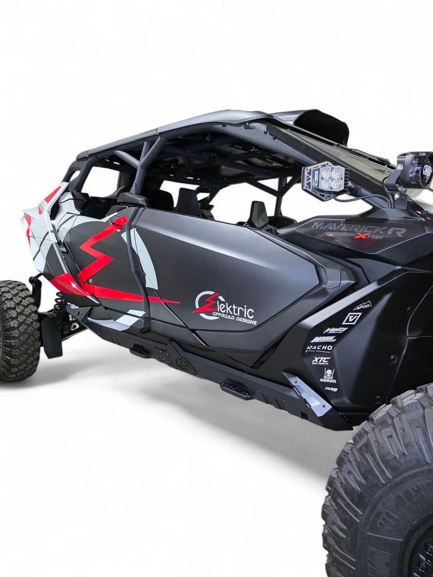 Black off-road vehicle with red accents on a white background