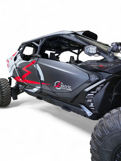 Black off-road vehicle with red accents on a white background
