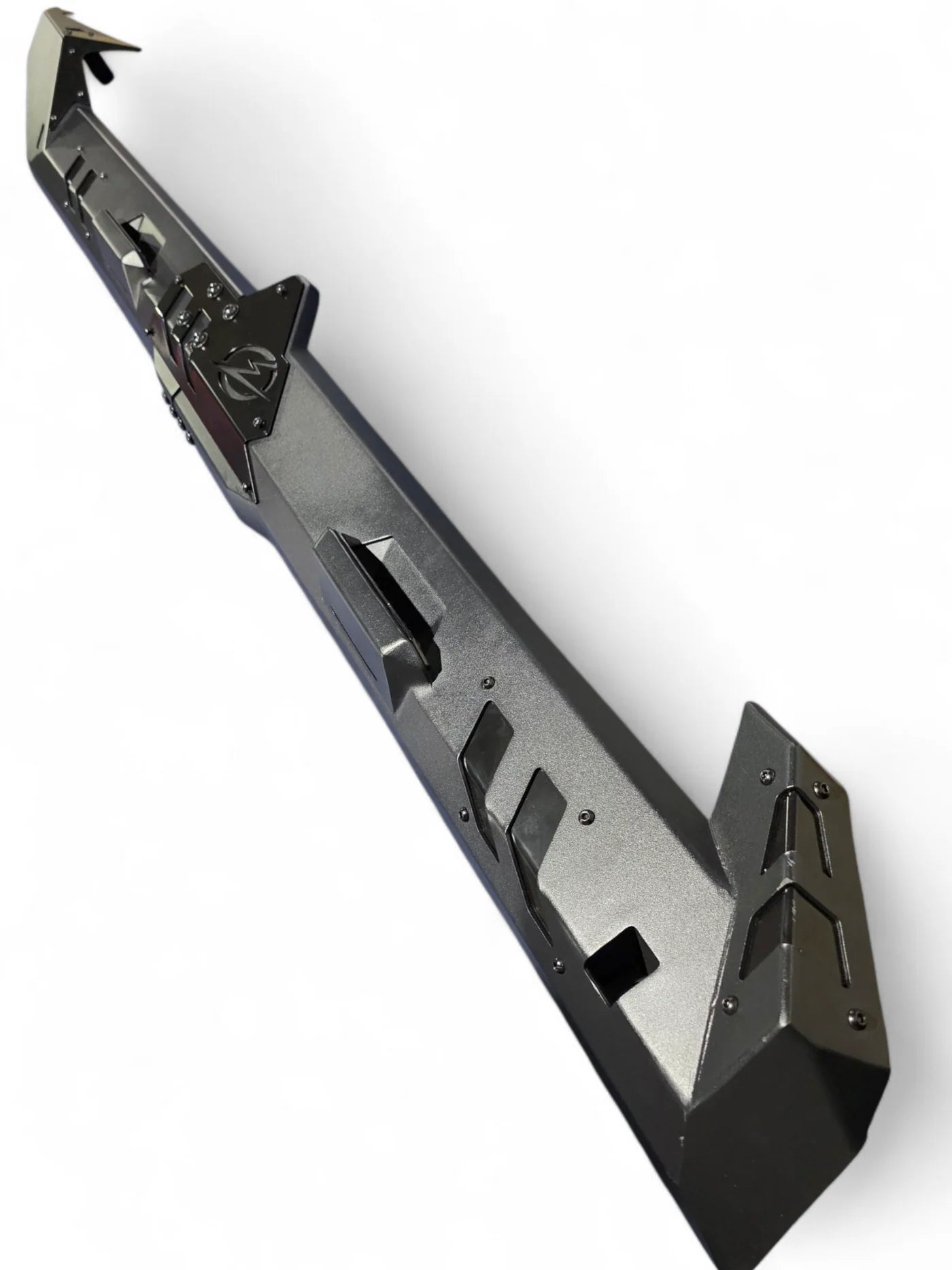 Black vehicle bumper on a white background