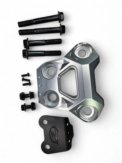Metallic mechanical component with screws on a white background