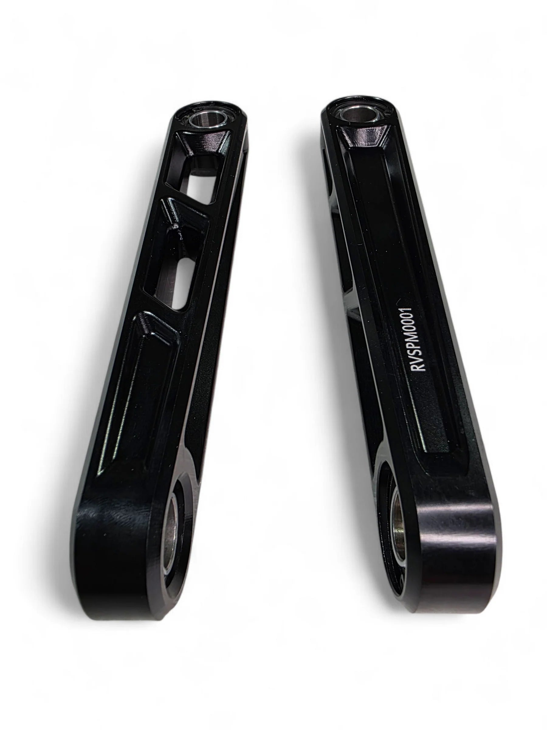 Two black Elektric Offroad Front sway bar links on white background