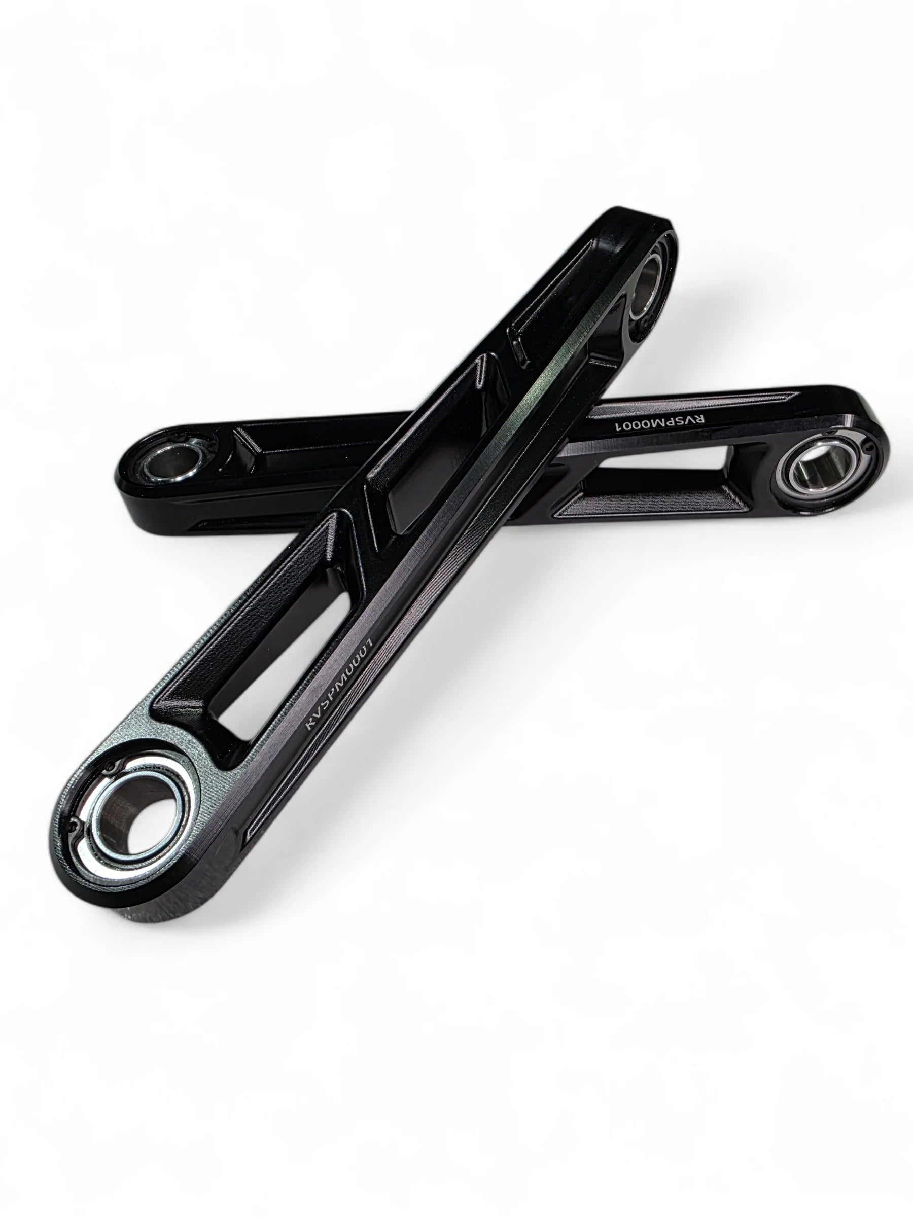 Two Front Sway Bar links crossed on white back ground