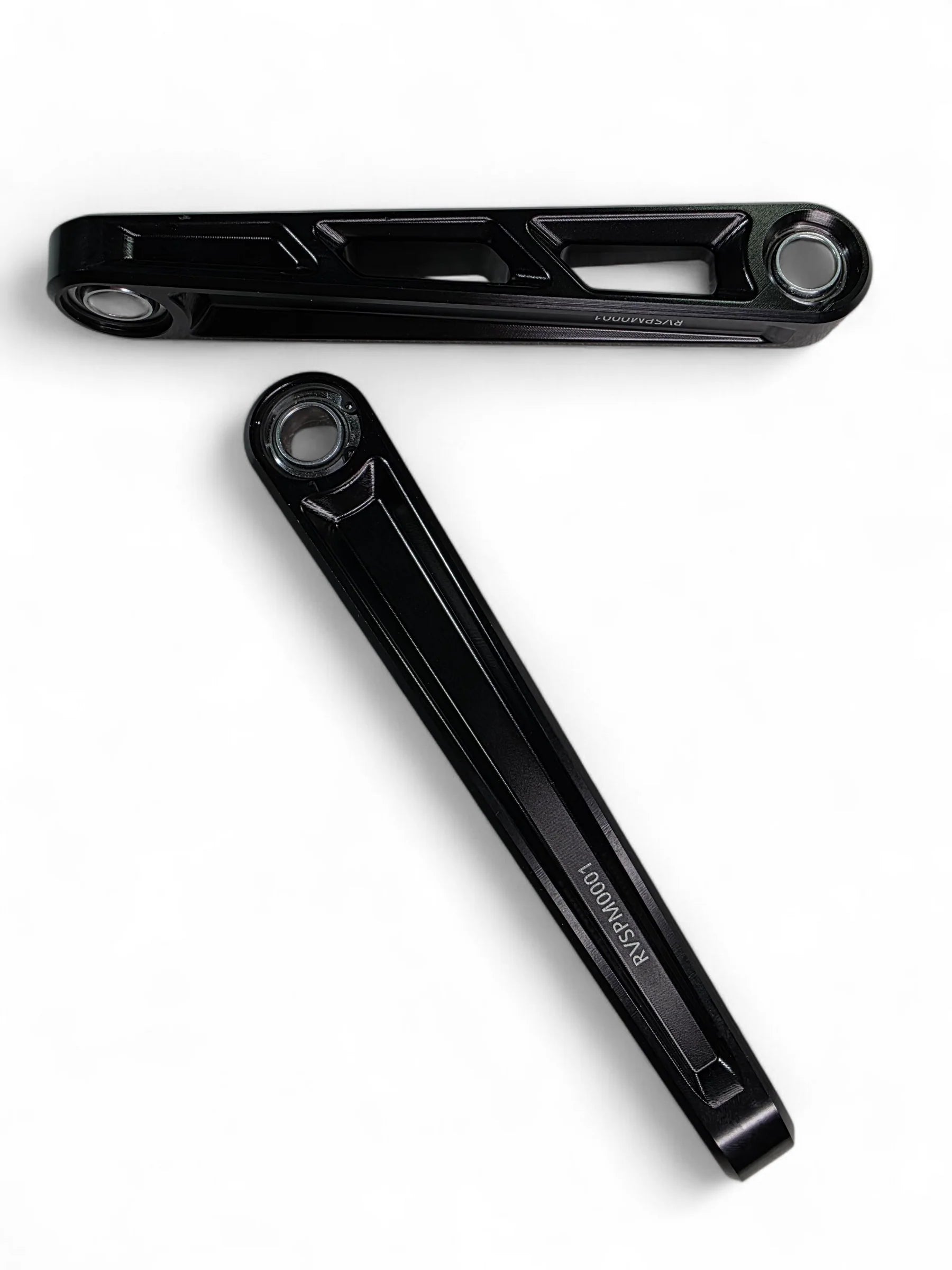 two black sway bar links on a white background