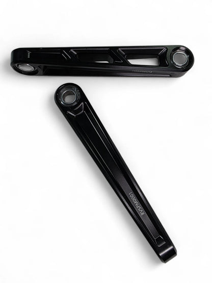 two black sway bar links on a white background