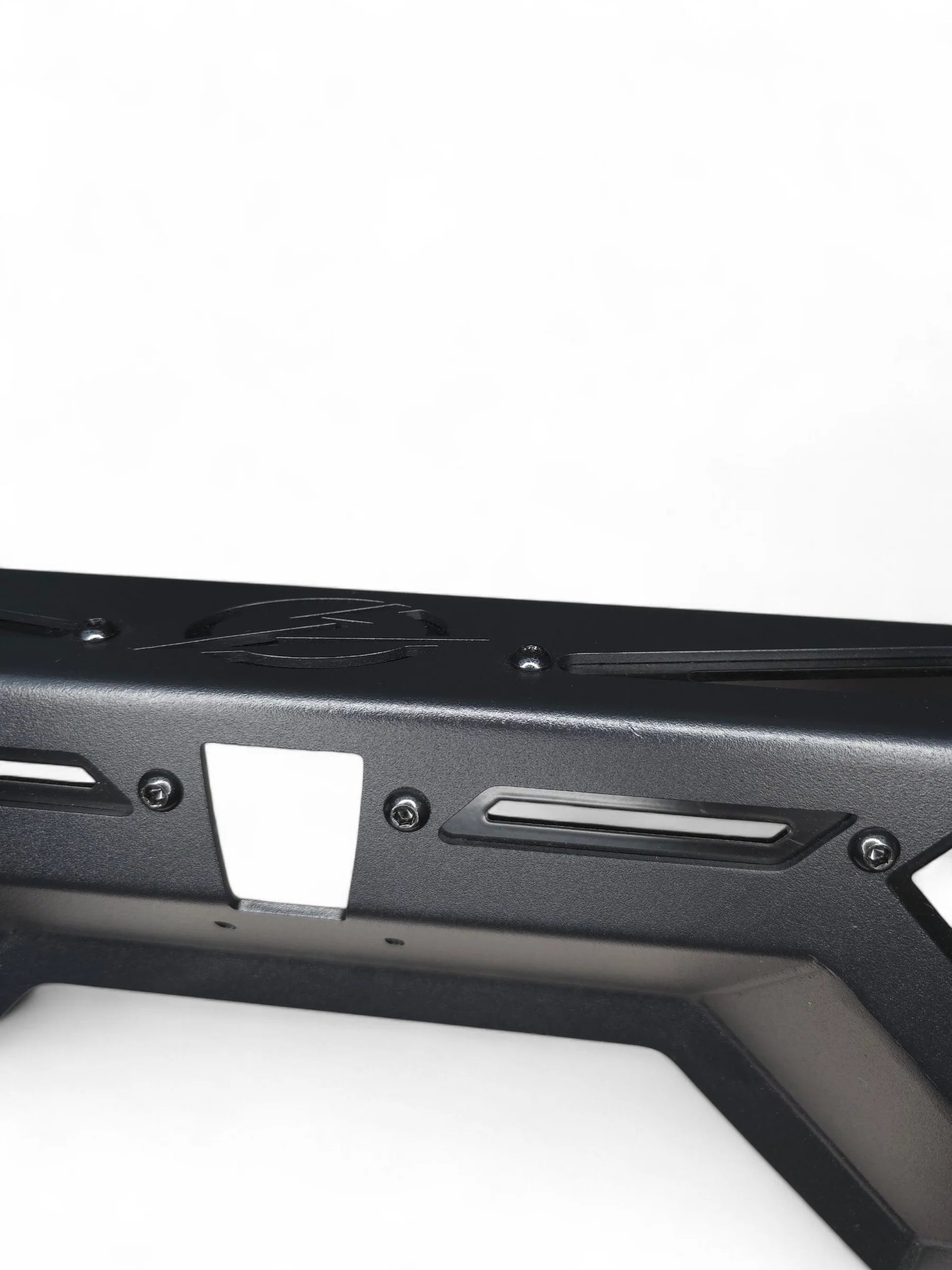 Black metal frame with cutouts on a white background