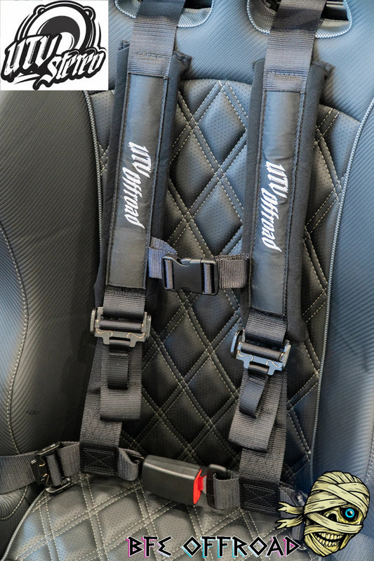 Gray 4-point harness seat belt with 'BFE Offroad' branding on a car seat.