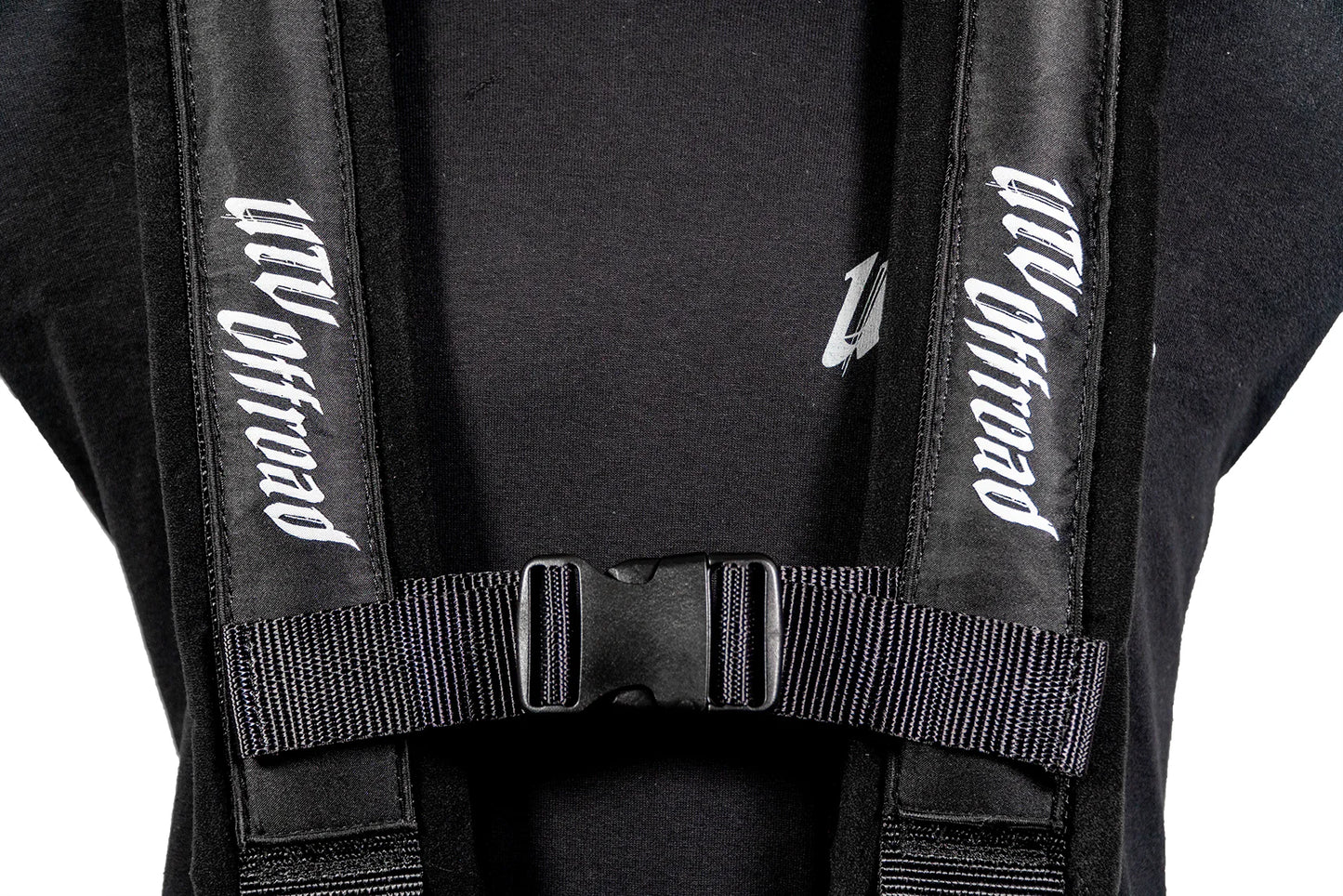 Black backpack with visible branding on straps against a white background