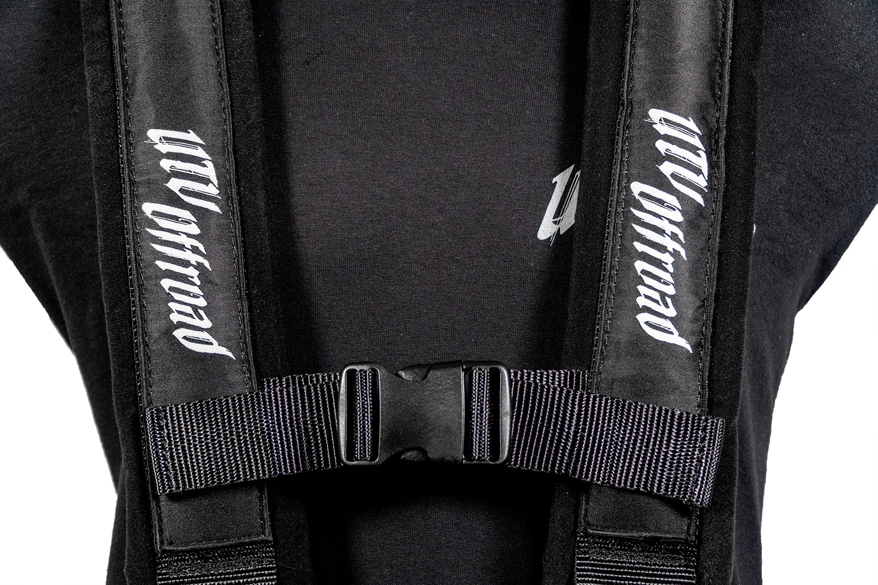 Black backpack with visible branding on straps against a white background