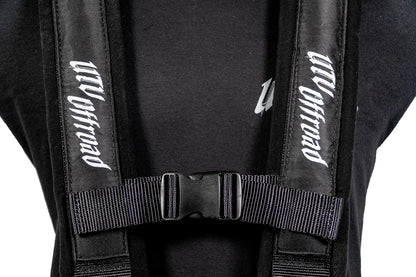 Black backpack with visible branding on straps against a white background