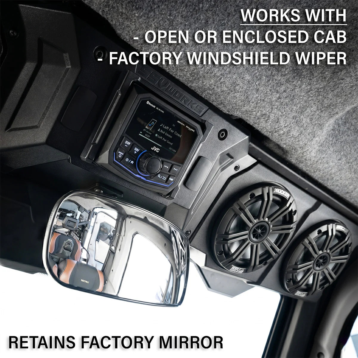 Automotive audio system with speakers and mirror in a vehicle interior, featuring text about cab and windshield wiper compatibility.