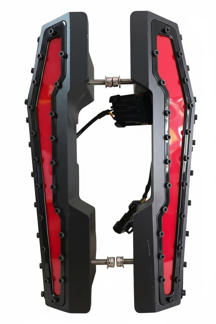 Black and red mechanical device on a white background