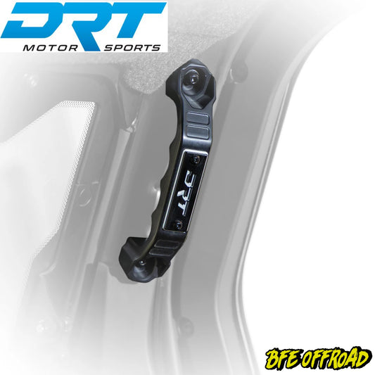 Black suspension link with DRT Motor Sports branding on a white background