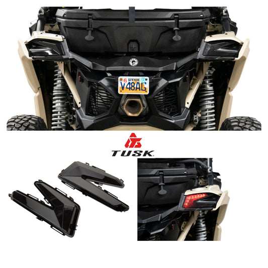 Front view of an ATV with Tusk product components displayed below.