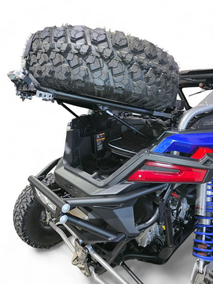 ATV with a spare tire mounted on the back