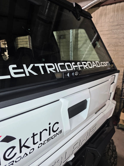 Back of a white off-road vehicle with 'Ektric Off-Road' branding.