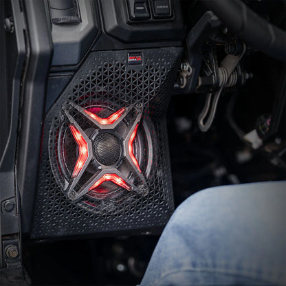 Car audio speaker with red lighting inside a vehicle