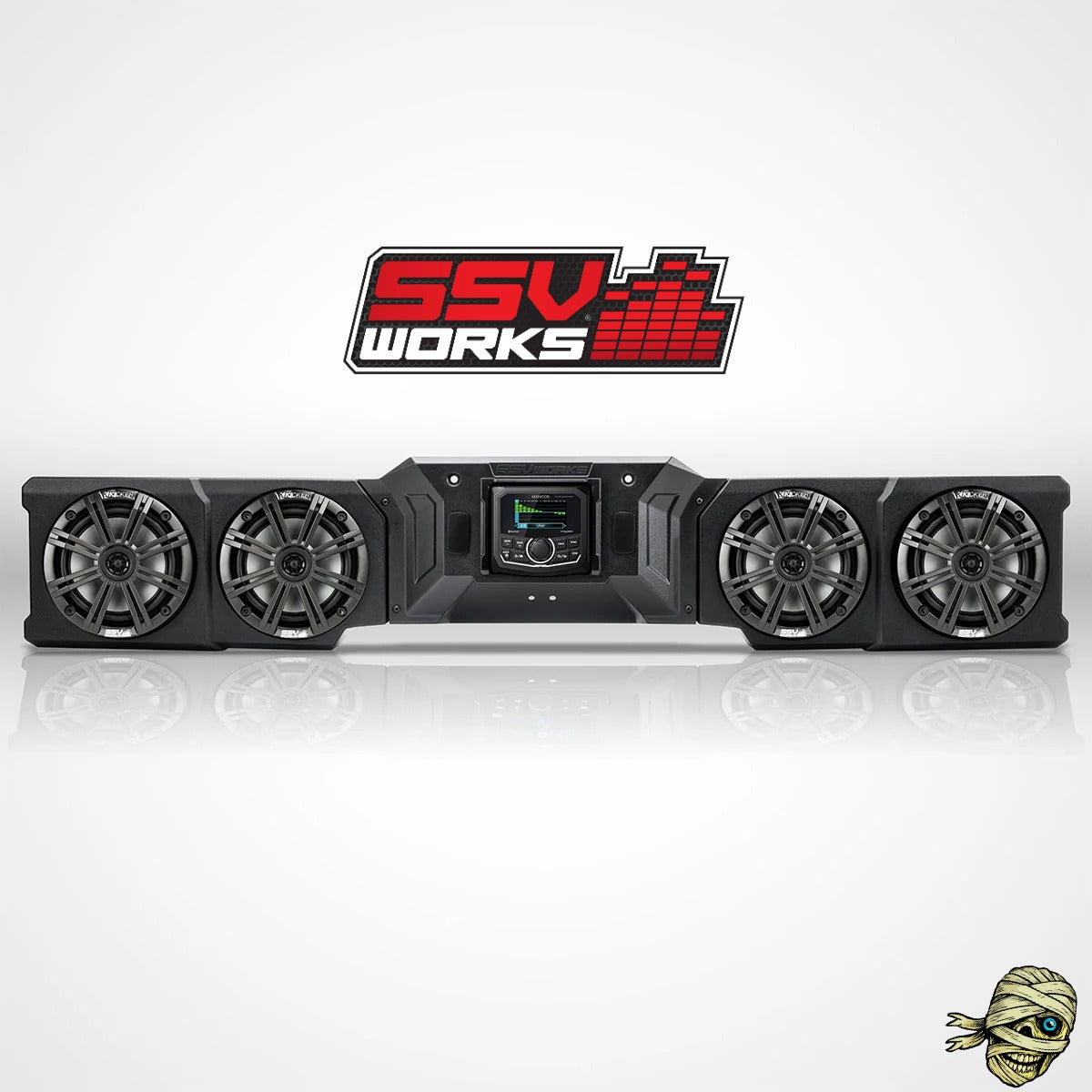 SSV Works 5-speaker car audio bar in black, shown on a light gray reflective background with the SSV WORKS logo above and a small mummy graphic in the bottom right corner.