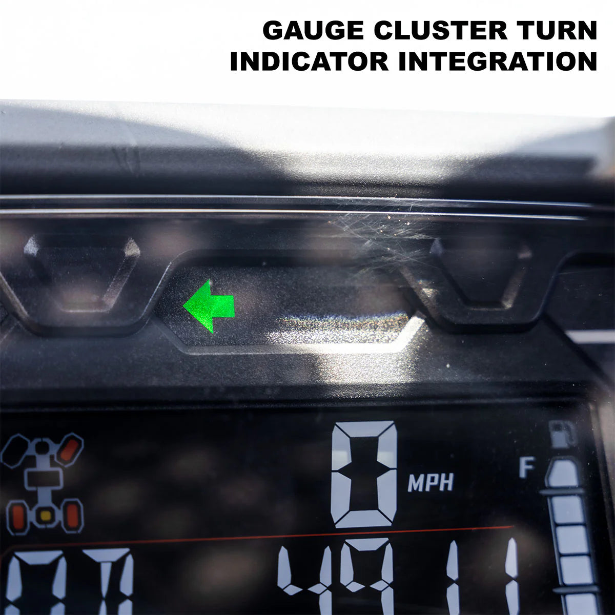  dashboard with gauge cluster turn indicator integration showing a green arrow.