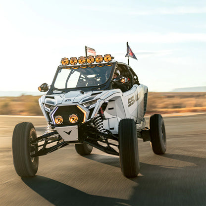 Off-road vehicle with large tires on a track