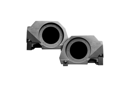 Two gray subwoofer enclosures on a white background