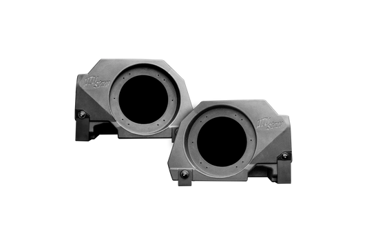 Two gray subwoofer enclosures on a white background