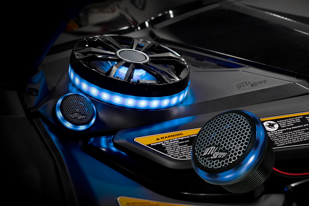 Close-up of a car's engine with a cooling system featuring blue LED lights.
