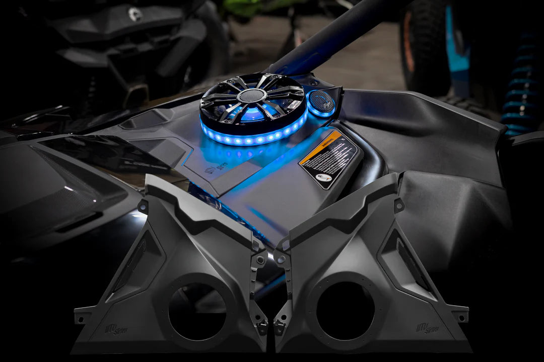 Close-up of a motorcycle engine with a cooling system and blue LED lights.