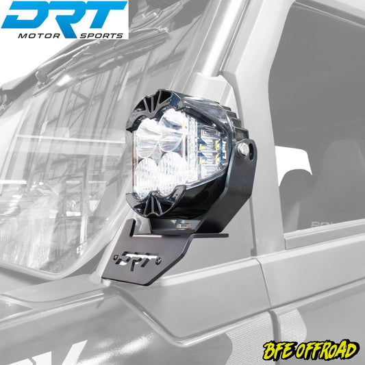 Off-road vehicle light mount with DRT Motor Sports branding on a vehicle.